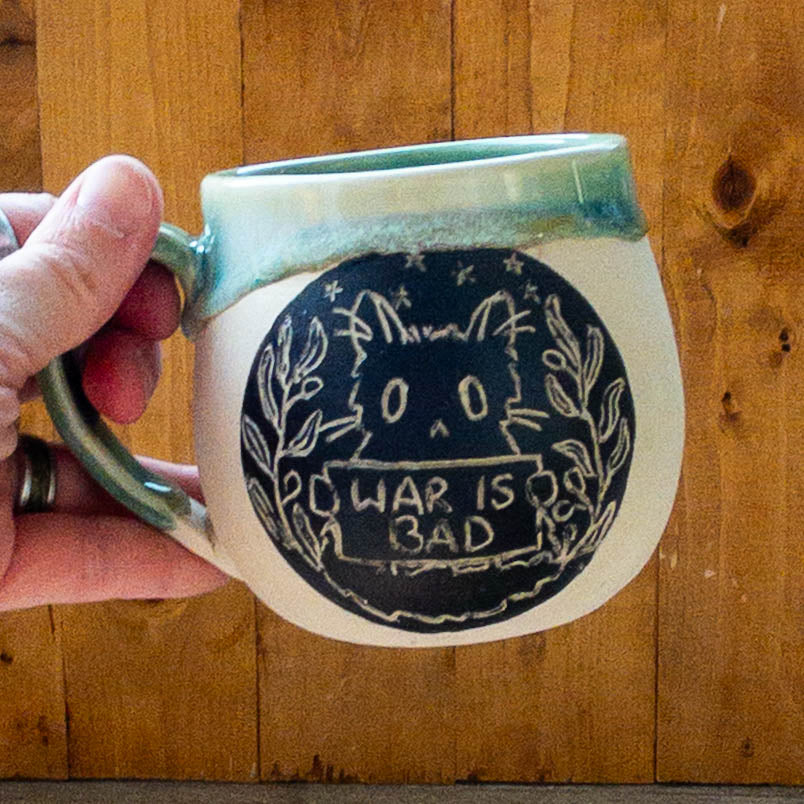 Fundraiser “War Is Bad” Cat Mug - Taylor
