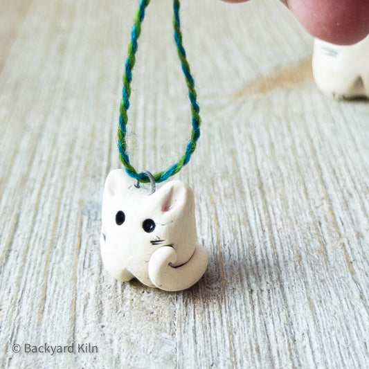 White Cat Ornaments by Taylor