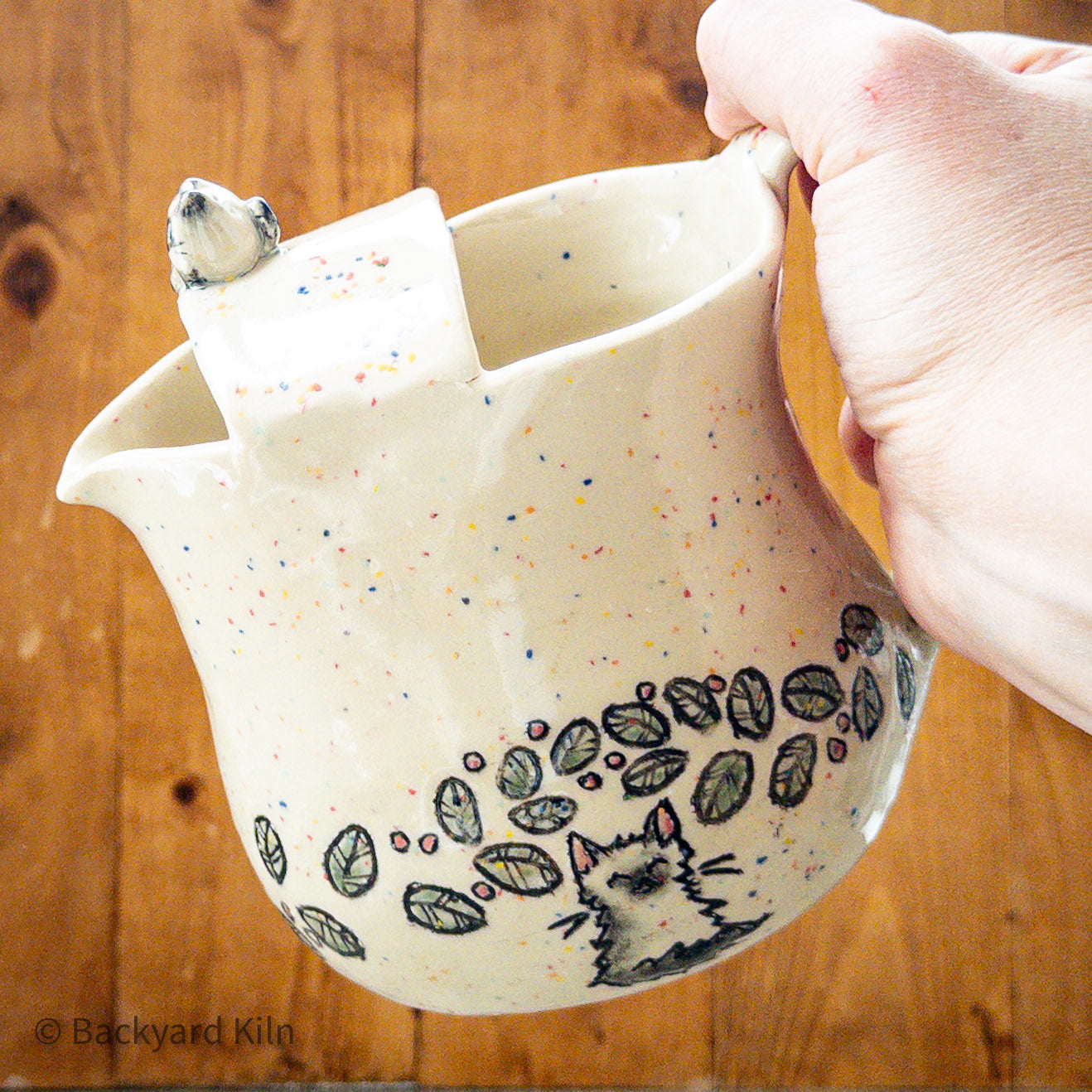 Cat with Rainbow Specks and Leaves Pitcher by Taylor