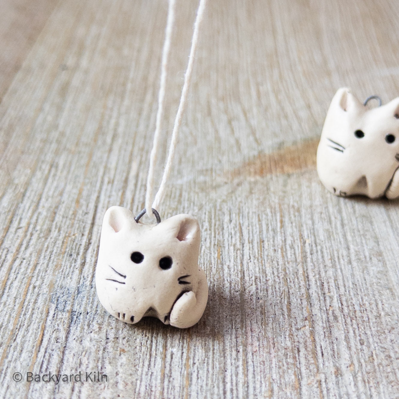 White Cat Ornaments by Taylor