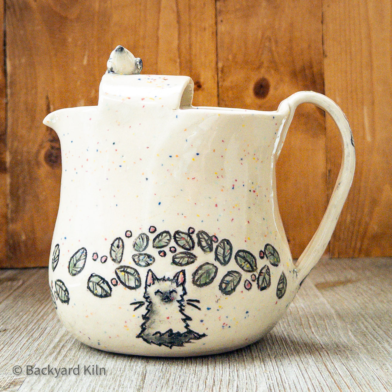 Cat with Rainbow Specks and Leaves Pitcher by Taylor