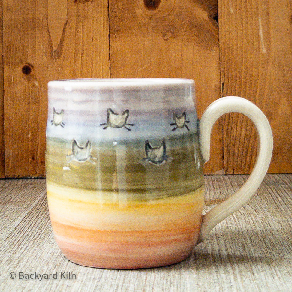 Rainbow Cat Heads Mug by Taylor