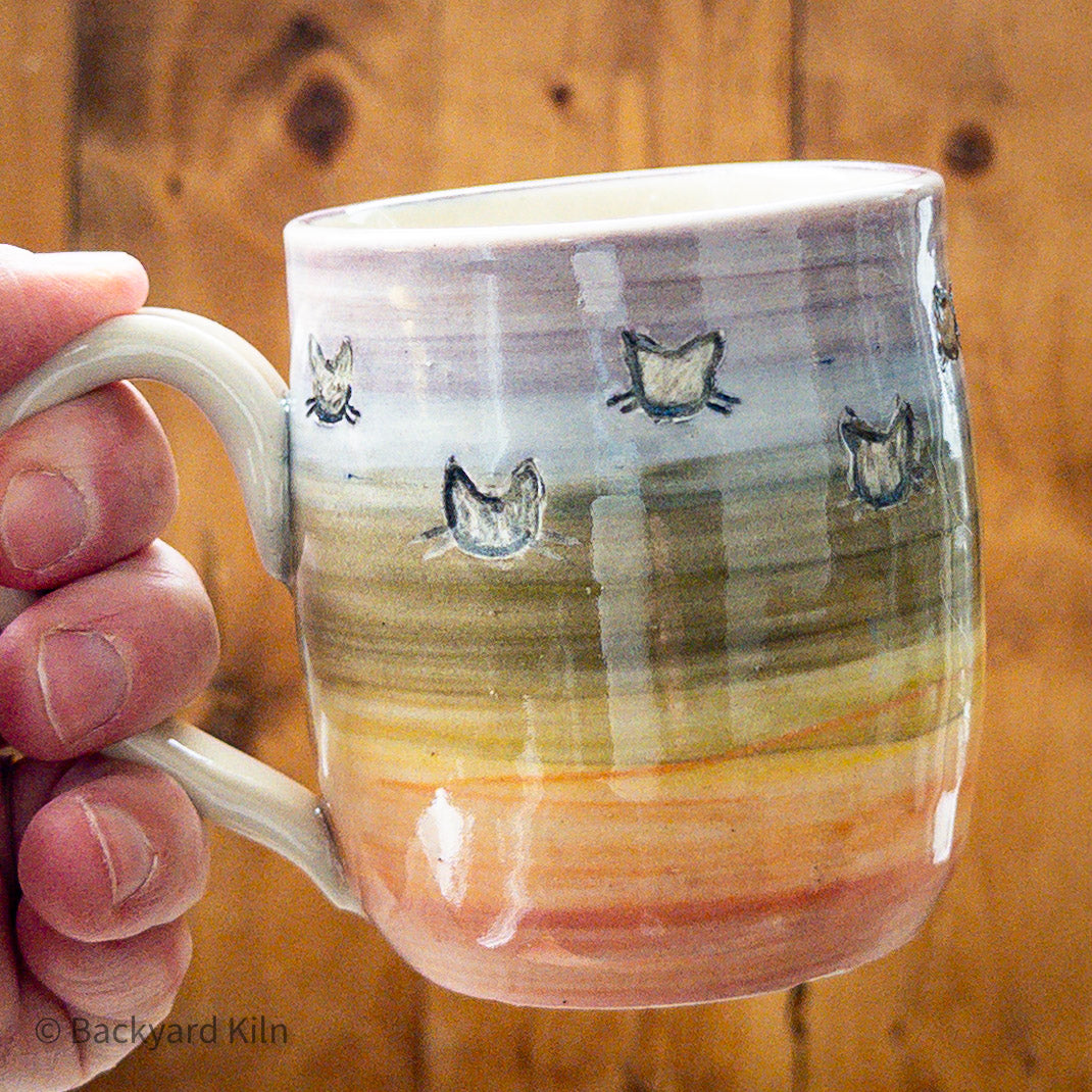 Rainbow Cat Heads Mug by Taylor