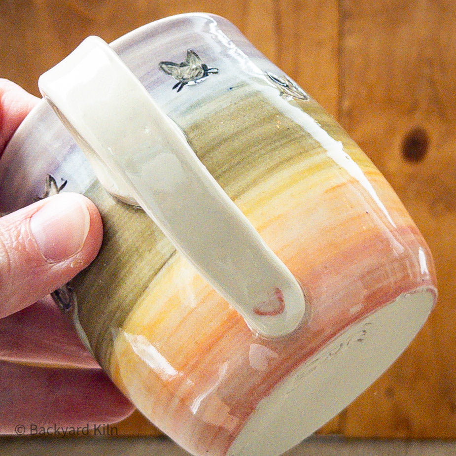 Rainbow Cat Heads Mug by Taylor