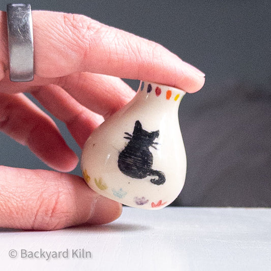 Tiny Black Cat Rainbow Vase by Taylor